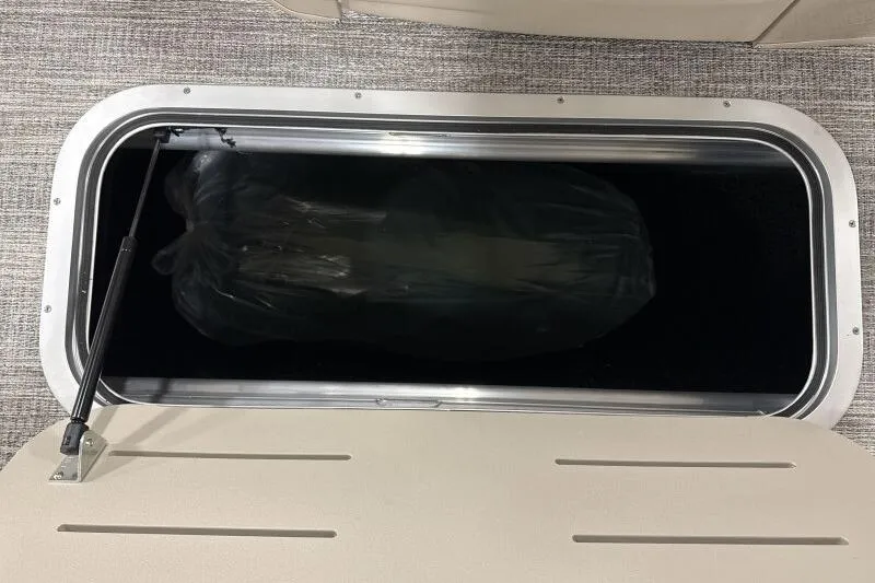 Slide: The Image of Storage compartment in 2026 Bennington 24 M L-Bench boat, featuring sleek design and functionality. - 23