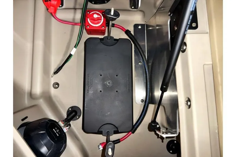 Slide: The Image of Battery compartment of 2026 Bennington 24 M L-Bench boat with wiring and components. - 27