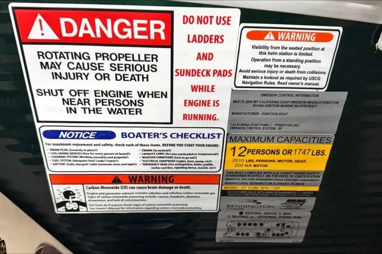 Slide: The Image of Safety warnings and capacity limits on a 2026 Bennington 24 M L-Bench boat. - 28