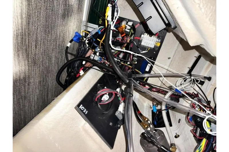 Slide: The Image of Electrical wiring and components inside a 2026 Bennington 24 M L-Bench boat. - 29