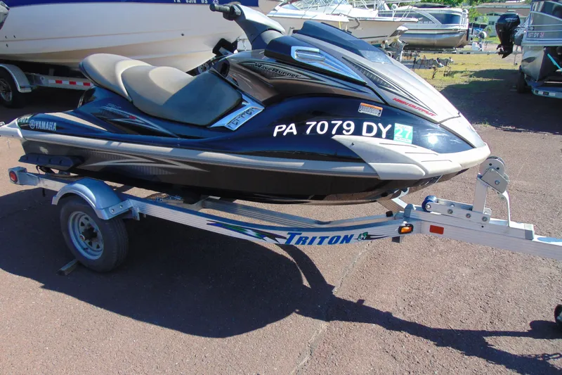 The Image of 2010 Yamaha WaveRunner FX HO on Triton trailer in a boatyard. - 1