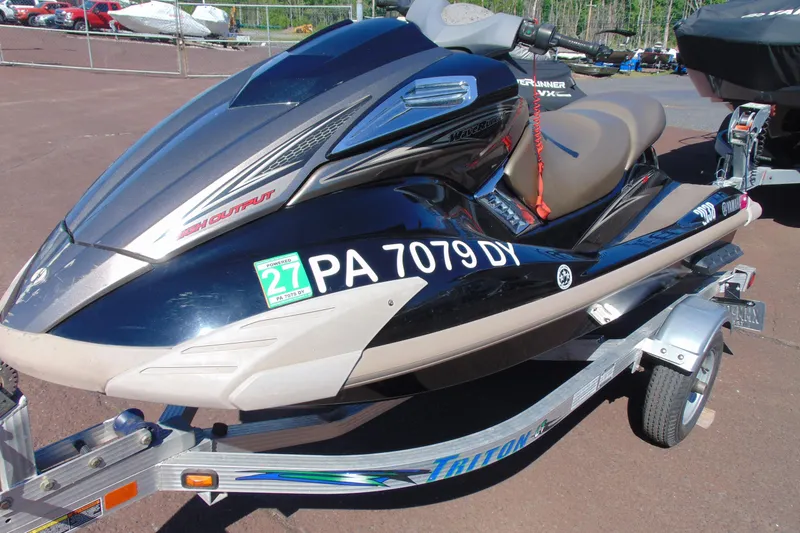 Slide: The Image of 2010 Yamaha WaveRunner FX HO on trailer, parked outdoors, with registration number visible. - 3