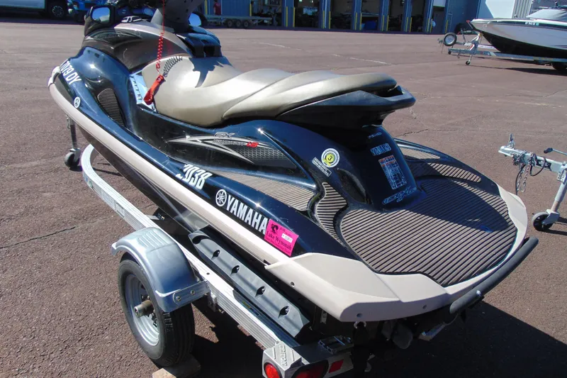 Slide: The Image of 2010 Yamaha WaveRunner FX HO on trailer, parked outdoors. - 4