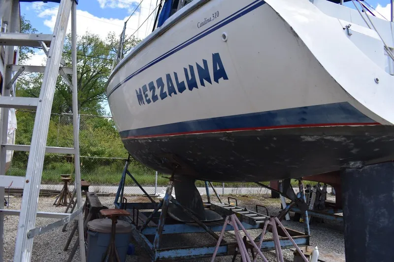 Slide: The Image of Catalina 310 sailboat named Mezzaluna on dry dock, 2001 model. - 5