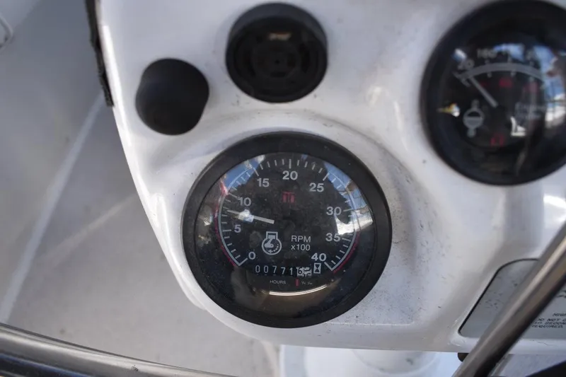 Slide: The Image of Close-up of a 2001 Catalina 310 boat dashboard with RPM gauge. - 66