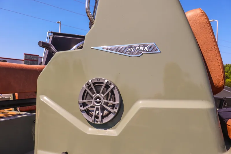 Slide: The Image of 2026 Avid 21 FSX boat console with speaker and logo detail. - 15