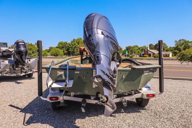 Slide: The Image of 2026 Avid 21 FSX boat with powerful outboard motor on a trailer. - 4