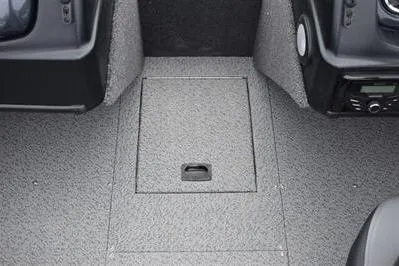 Slide: The Image of 2026 Lowe Fishing Machine 1675 WT boat interior with storage compartment. - 15