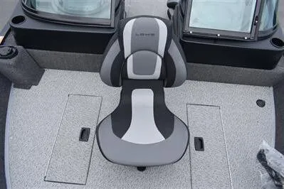 Slide: The Image of 2026 Lowe Fishing Machine 1675 WT boat interior with a central cushioned seat. - 17