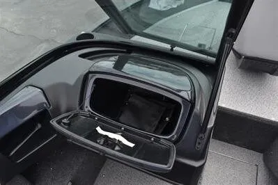 Slide: The Image of 2026 Lowe Fishing Machine 1675 WT boat interior storage compartment. - 24