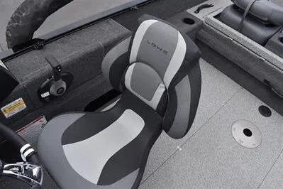 Slide: The Image of 2026 Lowe Fishing Machine 1675 WT interior with sleek, modern seating and controls. - 25