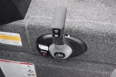 Slide: The Image of 2026 Lowe Fishing Machine 1675 WT throttle control on textured boat surface. - 31