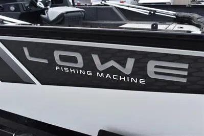Slide: The Image of 2026 Lowe Fishing Machine 1675 WT boat, side view with logo. - 6