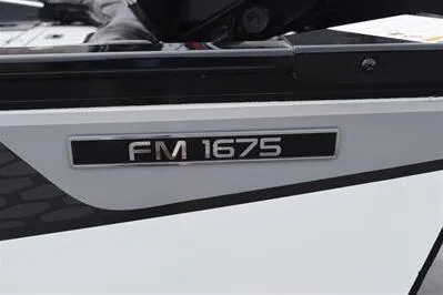 Slide: The Image of 2026 Lowe Fishing Machine 1675 WT boat model badge. - 7