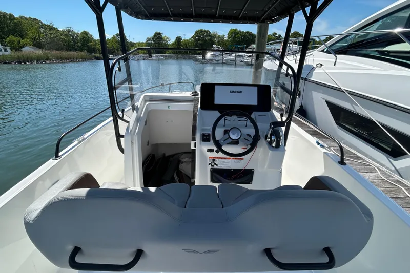 Slide: The Image of 2023 Beneteau Flyer 8 SPACEdeck helm on calm waters. - 6