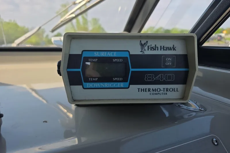 Slide: The Image of Fish Hawk Thermo-Troll 840 device on 1999 Bayliner 2452 Ciera Express dashboard. - 14