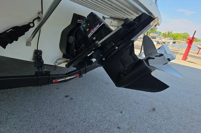 Slide: The Image of 1999 Bayliner 2452 Ciera Express boat with MerCruiser outdrive, parked on a trailer. - 15