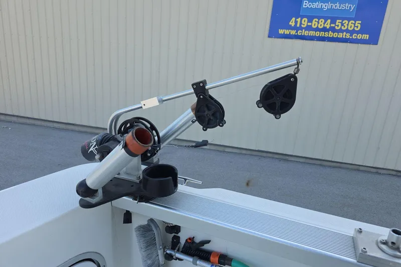 Slide: The Image of Fishing rod holder on 1999 Bayliner 2452 Ciera Express boat deck. - 9