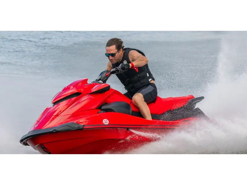 Slide: The Image of Man riding 2026 Yamaha GP SVHO jet ski on water. - 8