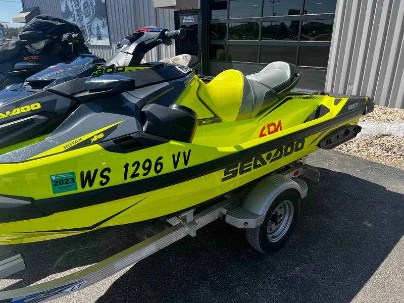 The Image of 2019 Sea-Doo RXT-X 300 iBR on trailer, yellow-black. - 1