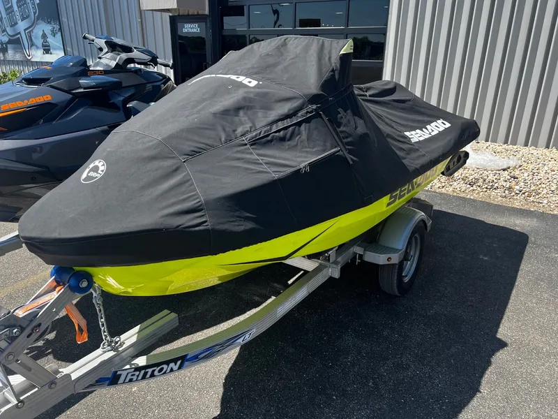 Slide: The Image of 2019 Sea-Doo RXT-X 300 iBR on trailer, covered. - 6