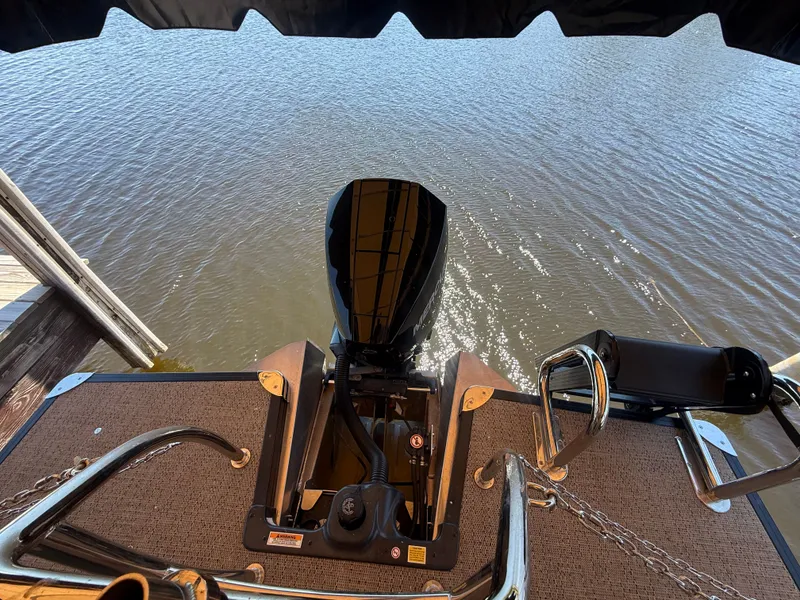 Slide: The Image of Barletta CABRIO 24 UETT 2024 boat motor by the water. - 15