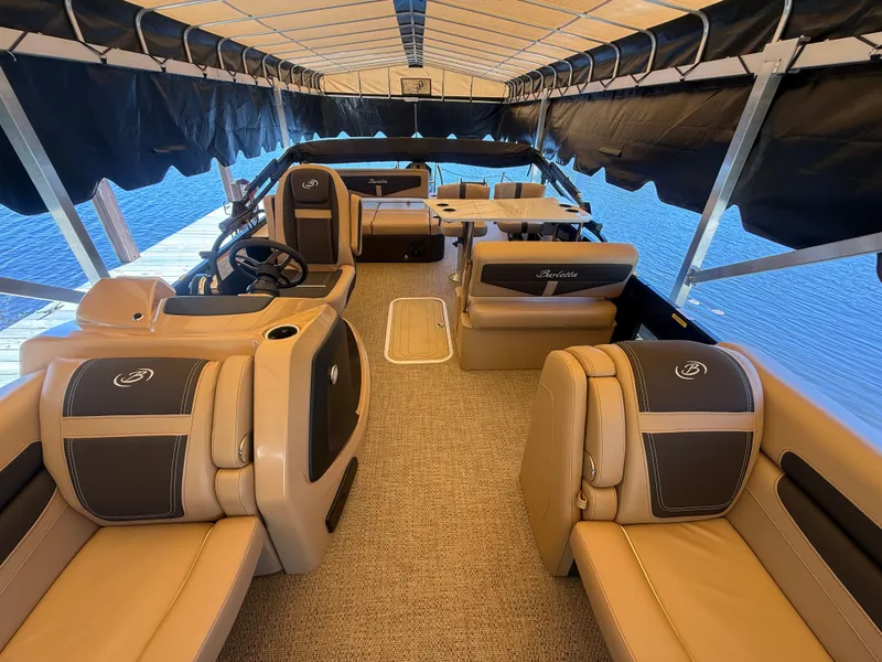 Slide: The Image of Interior of the 2024 Barletta CABRIO 24 UETT pontoon boat. - 4