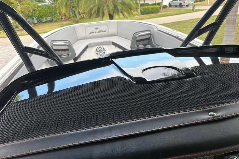 Slide: The Image of 2024 Nor-Tech 390 Sport Center Console interior with sleek design and modern features. - 13