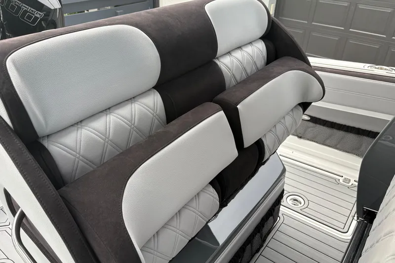 Slide: The Image of 2024 Nor-Tech 390 Sport Center Console boat seating with luxurious upholstery and modern design. - 17
