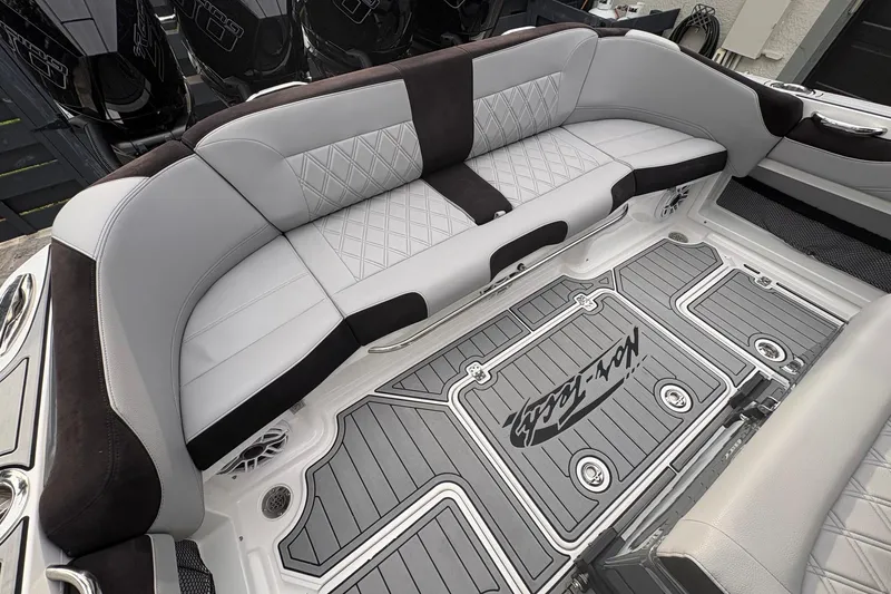 Slide: The Image of Luxurious seating on 2024 Nor-Tech 390 Sport Center Console boat, featuring elegant upholstery and design. - 20