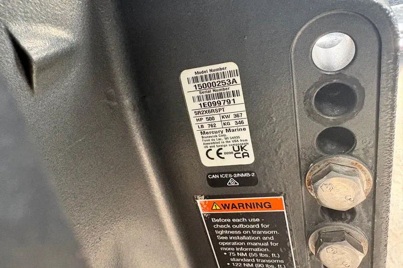 Slide: The Image of Label and warning sticker on 2024 Nor-Tech 390 Sport Center Console boat. - 37