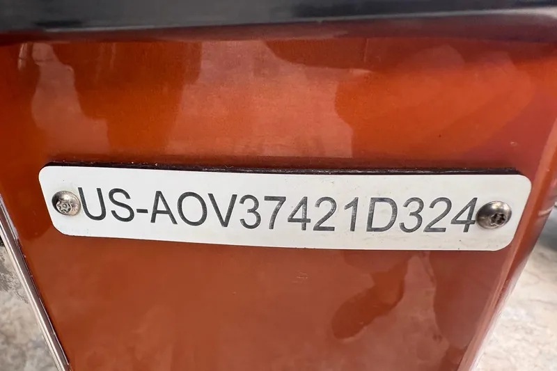 Slide: The Image of 2024 Nor-Tech 390 Sport Center Console hull identification number plate. - 40