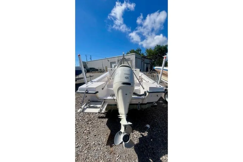 Slide: The Image of 1994 Grady-White Spirit 175 boat with outboard motor. - 11