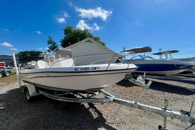 Slide: The Image of 1994 Grady-White Spirit 175 boat on trailer under sunny skies. - 3