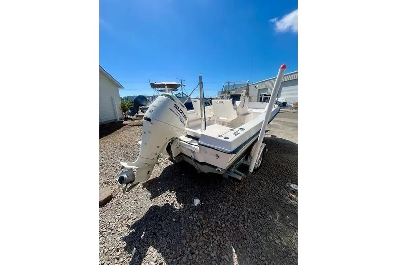 Slide: The Image of 1994 Grady-White Spirit 175 boat with Suzuki outboard motor. - 4