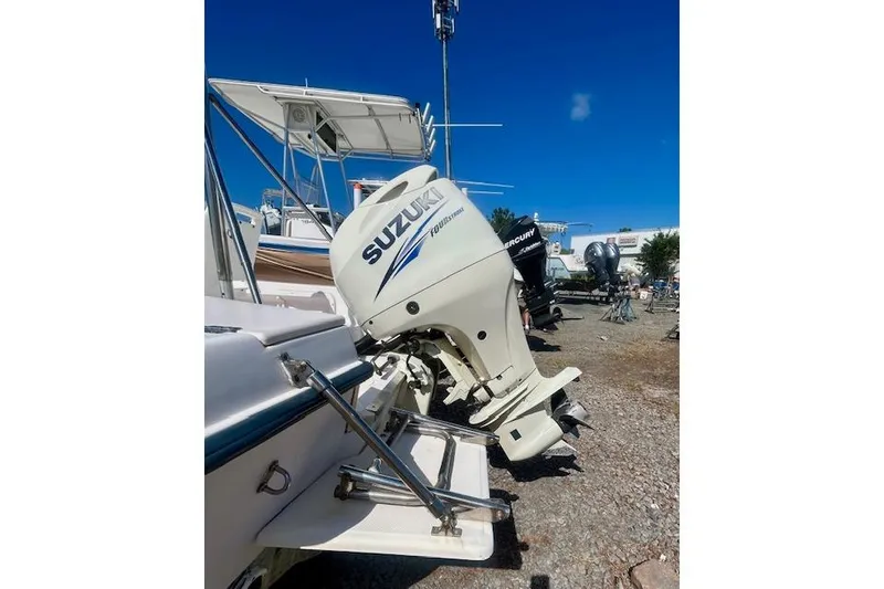 Slide: The Image of Outboard motor of a 1994 Grady-White Spirit 175 boat. - 5