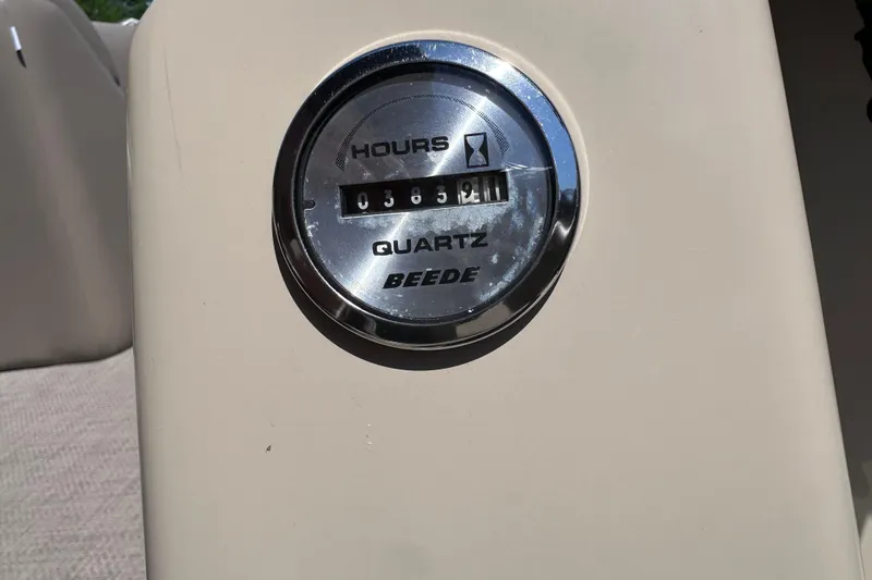 Slide: The Image of Hour meter on 2015 JC 24 Tri-Toon boat, displaying 382.1 hours. - 15