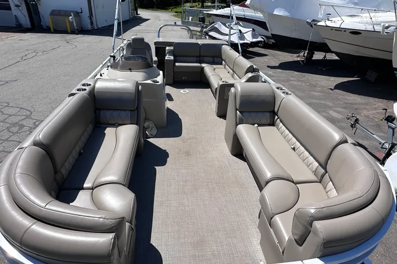 Slide: The Image of 2015 JC 24 Tri-Toon boat with spacious seating and modern design. - 22