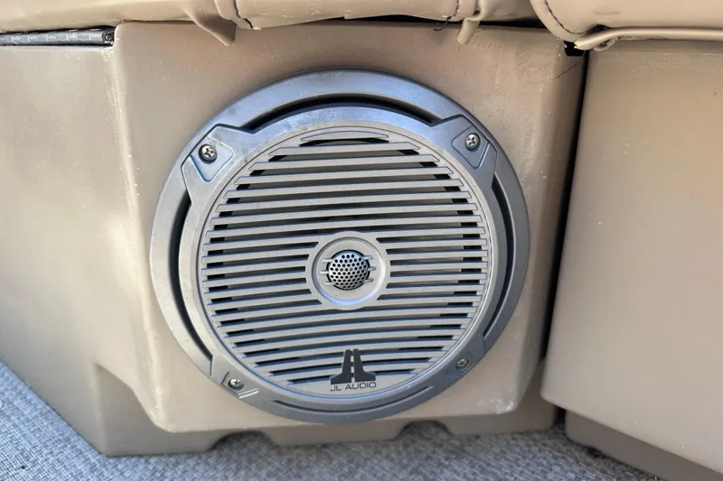 Slide: The Image of Speaker on 2015 JC 24 Tri-Toon boat, featuring JL Audio marine sound system. - 23