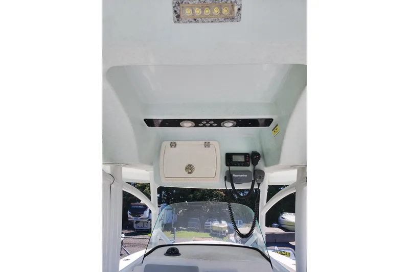 Slide: The Image of 2015 Sea Fox 286 Commander boat console with electronics and storage compartment. - 20