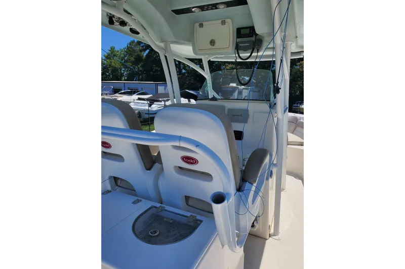 Slide: The Image of 2015 Sea Fox 286 Commander boat interior with seating and navigation equipment. - 29