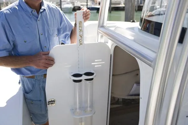 Slide: The Image of Manufacturer Provided Image: Man on a 2015 Sea Fox 286 Commander boat with fishing gear. - 5