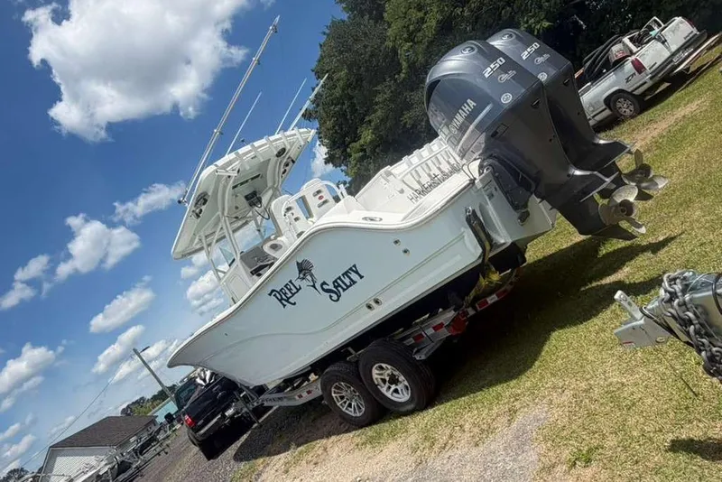 Slide: The Image of 2015 Sea Fox 286 Commander boat with dual Yamaha engines on a trailer. - 8