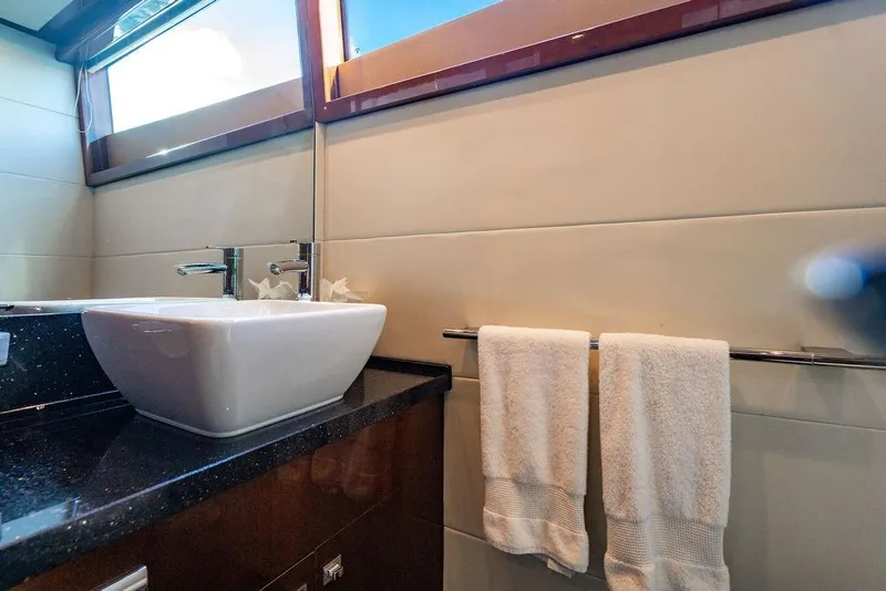 Slide: The Image of Luxurious bathroom interior of 2010 Princess 95 Motor Yacht with modern sink and towels. - 107