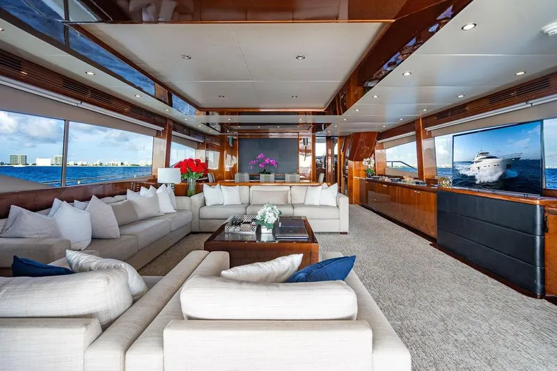 Slide: The Image of Luxurious interior of 2010 Princess 95 Motor Yacht with elegant seating and ocean views. - 11