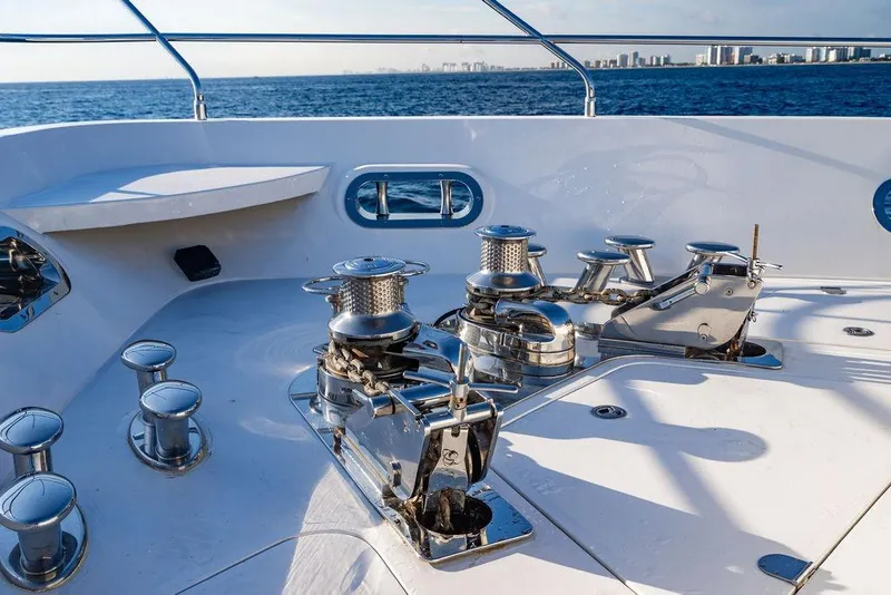 Slide: The Image of Deck view of 2010 Princess 95 Motor Yacht with winches and ocean backdrop. - 33