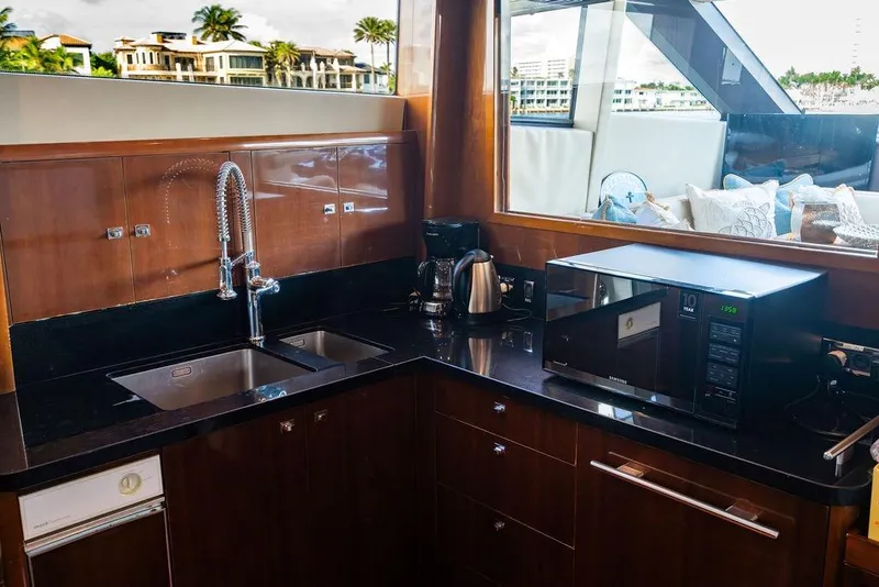 Slide: The Image of Luxurious kitchen on a 2010 Princess 95 Motor Yacht with modern appliances. - 74