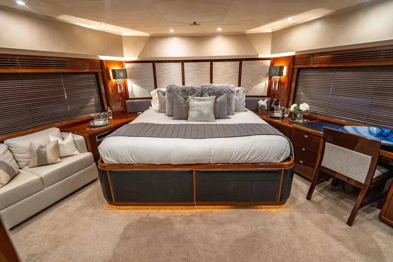 Slide: The Image of Luxurious bedroom interior of 2010 Princess 95 Motor Yacht with elegant furnishings. - 87