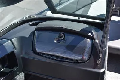 Slide: The Image of 2026 Lowe Fish & Ski 1700 boat dashboard with sleek design and modern controls. - 24
