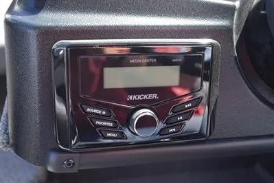 Slide: The Image of 2026 Lowe Fish & Ski 1700 boat media center with Kicker audio system. - 27
